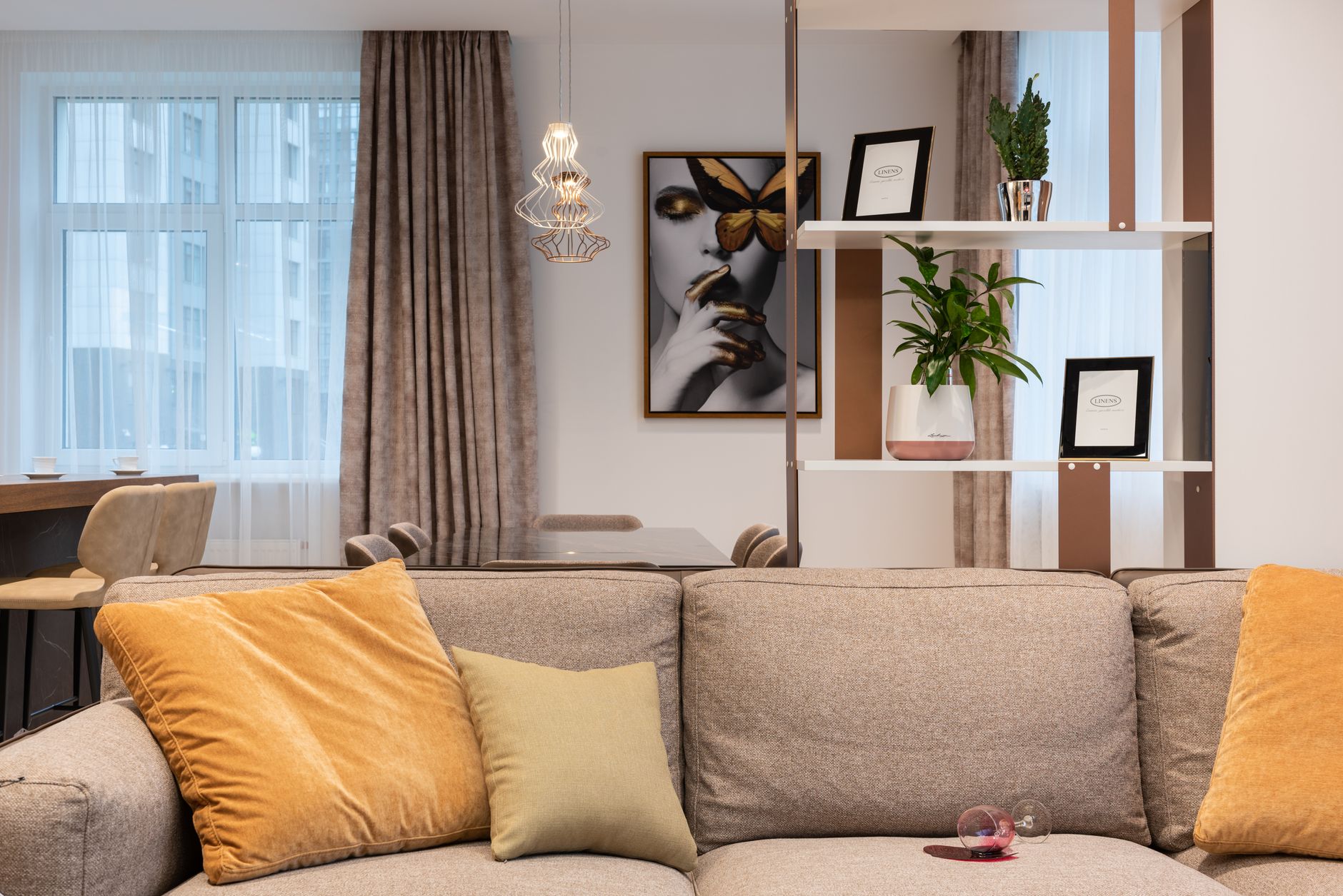 Bright living room with framed art above a sofa