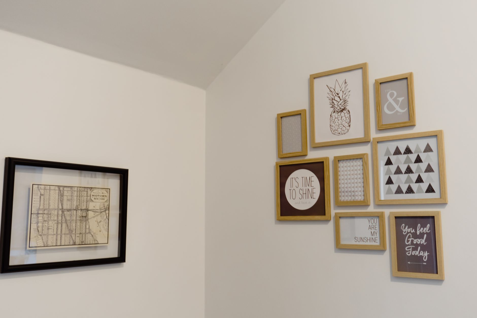 Gallery wall of picture frames on a white wall